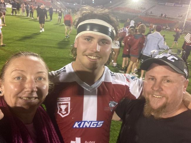 Liam Hampson (middle) with stepmum Jamie Hampson (left) and dad Brett Hampson (right) after a game.