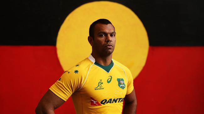 Kurtley Beale poses for a portrait with a mural of the aboriginal flag during The 2016 Wallabies Jersey Launch at All Sorts Sports Factory in Alexandria, Sydney. Pic Brett Costello