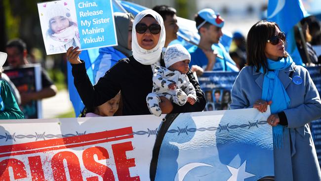 Protesters attend a rally for the Uighur community at Parliament House in Canberra last month. Picture: Getty Images