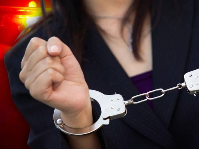 Handcuffs woman generic. Picture: Canva