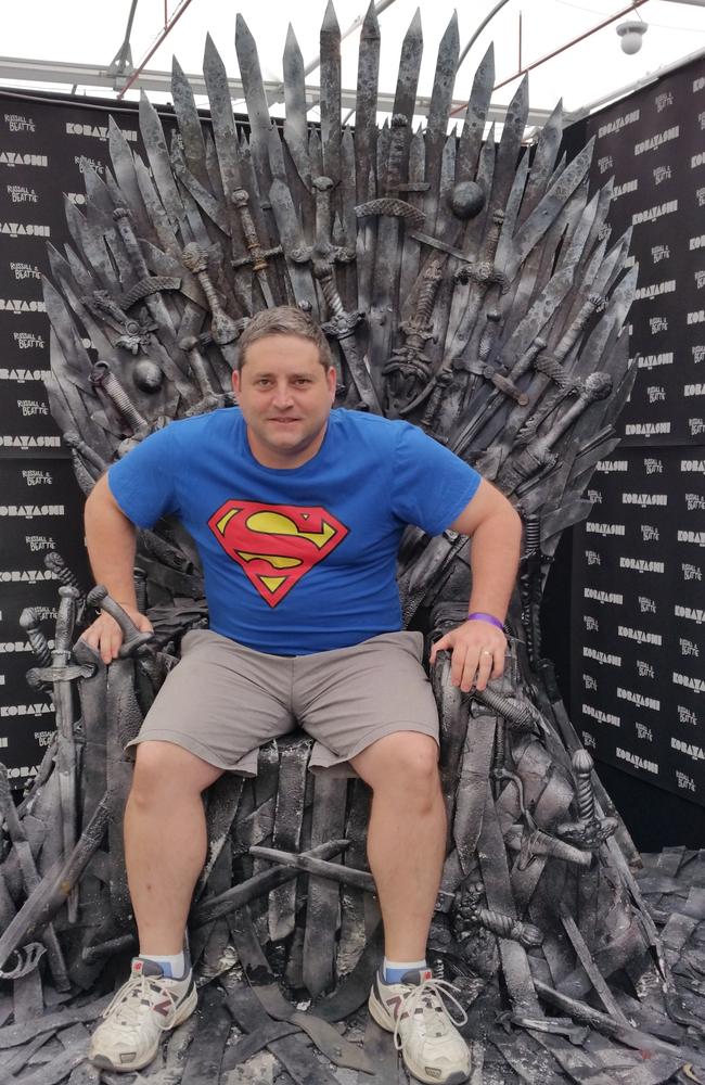 Matthew Perna at the 2015 Sydney Oz Comicon sitting on the Iron Throne. Picture: Contributed by Matthew Perna