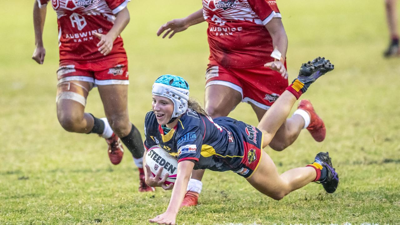 Chloe Pallisier dives in for a try. Picture: Nev Madsen