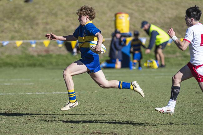 Myles Rosemond breaks away for Toowoomba Grammar School. Picture: Kevin Farmer