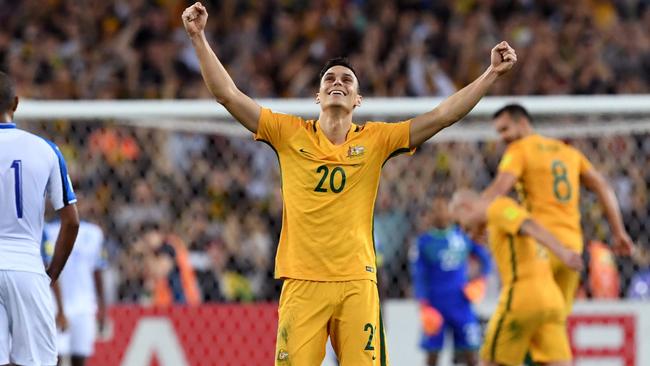 Australia's Trent Sainsbury celebrates after Australia defeated Honduras in their 2018 World Cup qualification play-off football match at Stadium Australia in Sydney on November 15, 2017. / AFP PHOTO / William WEST / -- IMAGE RESTRICTED TO EDITORIAL USE - STRICTLY NO COMMERCIAL USE --