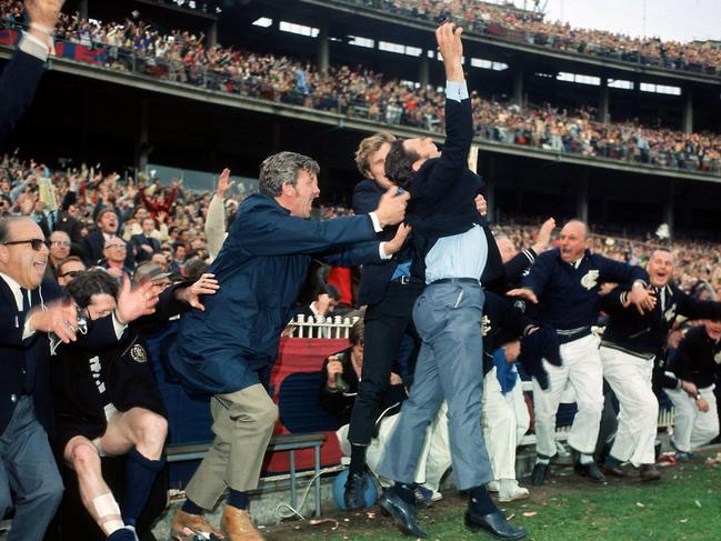 Ron Barassi jumps for joy after Carlton’s stunning second half comeback win in 1970.