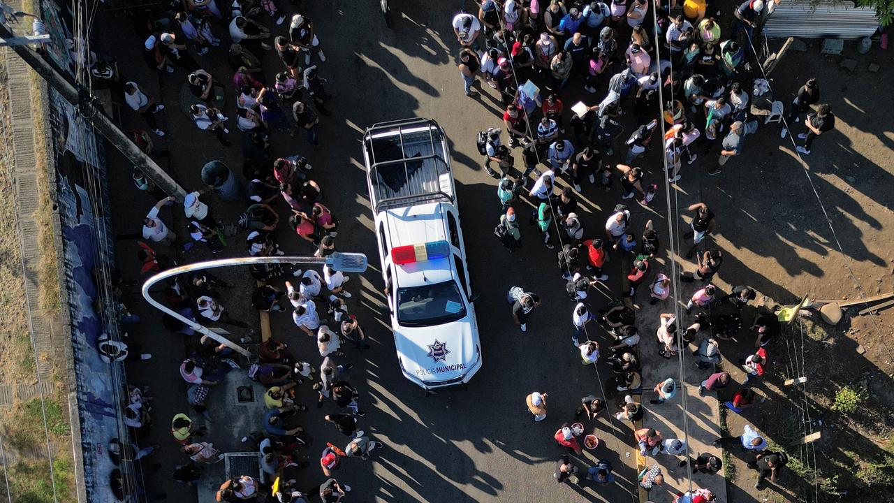 Aerial view as migrants wait outside the regional office of the National Migration Institute to transit through Mexican territory on their way to the US in Tapachula, Chiapas state, Mexico on January 13, 2025. Picture: Alfredo Estrella/AFP