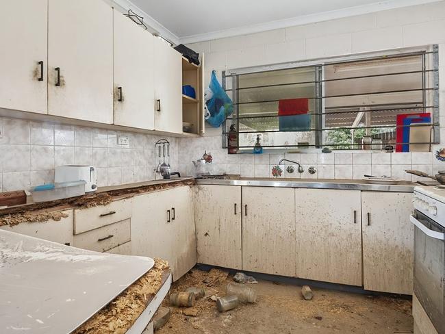 The home at 27 Oak St, Holloways Beach, is for sale after being flooded post-Cyclone Jasper. Picture: realestate.com.au