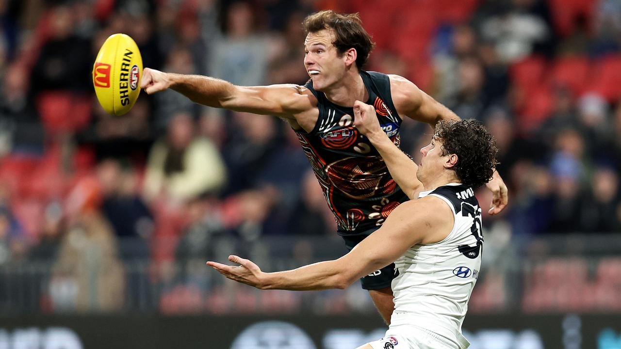 SYDNEY, AUSTRALIA - JULY 06: Jack Buckley of the Giants contests the ball with Charlie Curnow of the Blues during the round 17 AFL match between Greater Western Sydney Giants and Carlton Blues at ENGIE Stadium, on July 06, 2024, in Sydney, Australia. (Photo by Brendon Thorne/AFL Photos/via Getty Images)