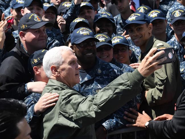 US Vice President Mike Pence poses for photographs with US soldiers. Picture: AFP