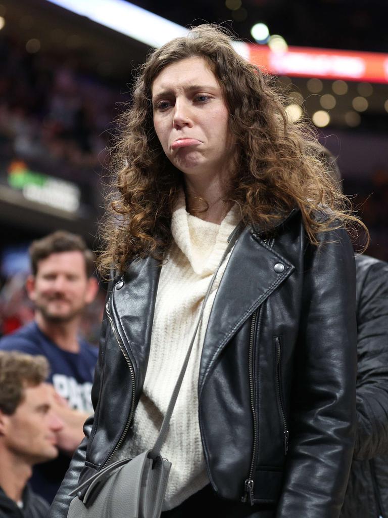 The woman pretended to be sad when kicked out. Andy Lyons/Getty Images/AFP