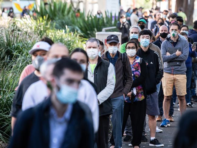 SYDNEY, AUSTRALIA - NewsWire Photos May 10, 2021:  People queuing to enter the NSW Vaccination Centre in Homebush, Sydney.Picture: NCA NewsWire / James Gourley