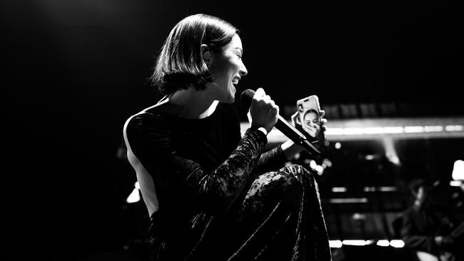 Abrams sings to a fan's phone during night one in Melbourne. Picture: Abby Waisler