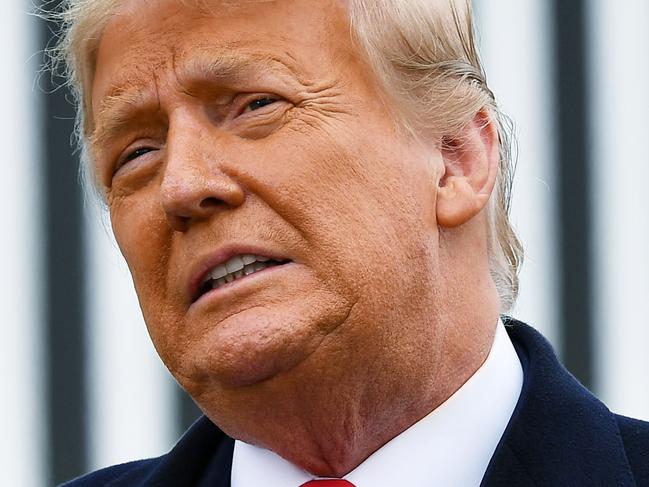 US President Donald Trump speaks following a section of the border wall in Alamo, Texas, on January 12, 2021. - Trump on January 13, 2021, became the first US president to be impeached for a second time, when a bipartisan majority in the House of Representatives voted to charge him with inciting last week's attack on the US Capitol. One week before Trump is to leave office, a total of 232 lawmakers, including 10 Republicans who broke with the president, voted to impeach the defiant Republican leader for high crimes and misdemeanors on a single charge of "incitement of insurrection." (Photo by MANDEL NGAN / AFP)