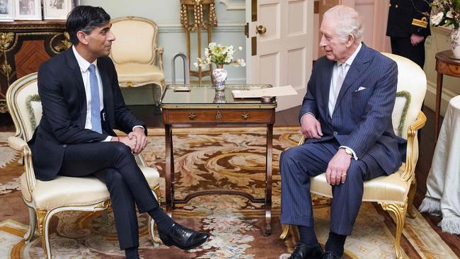 The monarch chats with British Prime Minister Rishi Sunak at Buckingham Palace. Picture: AFP