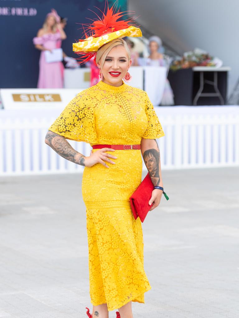 Fashions on the Field competitor Marina Ferencek is wearing a dress from Keepsake the Label, a custom-made hat by Hats by Tracy Mac and shoes from Stop. Picture: Che Chorley