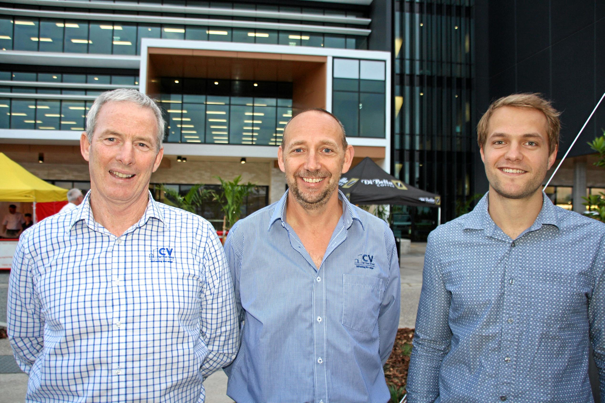 David Logan and Noel Cosgrove of CV Electrical with Fred Beytell of of Hutchinson Builders at the new Youi headquarters, Sippy Downs. Picture: Erle Levey