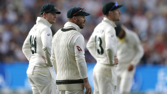 Steve Smith, left, David Warner and Cameron Bancroft feel the strain on day two. Picture: Getty Images