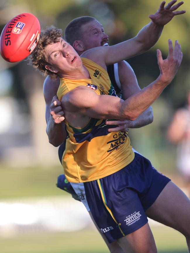 Eagle Patrick Weckert attempts a mark opposed to Port Adelaide’s Tom Clurey in the SANFL game at Woodville Oval on Sunday. Picture: Cory Sutton/SANFL