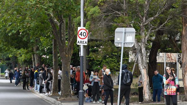 People are seen waiting in line at the Prahran Centrelink office in Melbourne. Picture: AAP