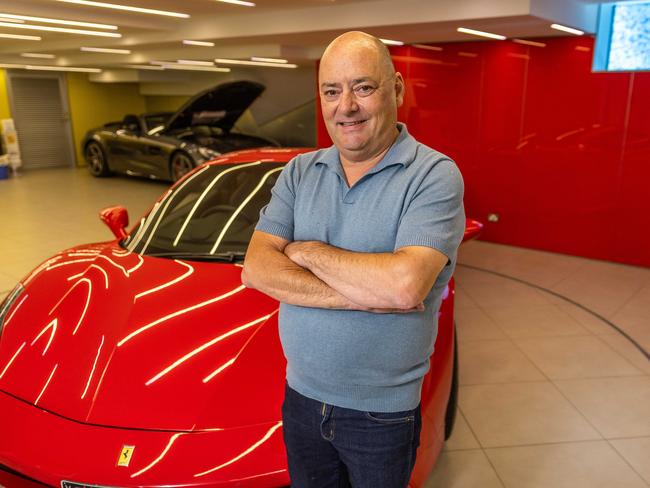 Danny Wallis is a noted revhead, with many luxury cars in the basement of his bayside home. Picture: Jake Nowakowski