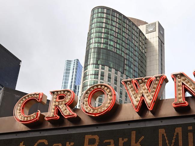 A sign advertises Crown Casino in Melbourne on June 9, 2022. (Photo by William WEST / AFP)