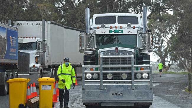 Police stopping trucks at the Victorian border near Bordertown in August. Now Victoria is set to slam the border shut on South Australia. Picture: Tom Huntley