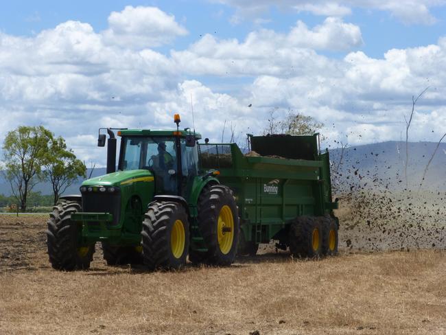 Arkwood Organic Recycling workers spread biosolids on crops for farmers.Contributed