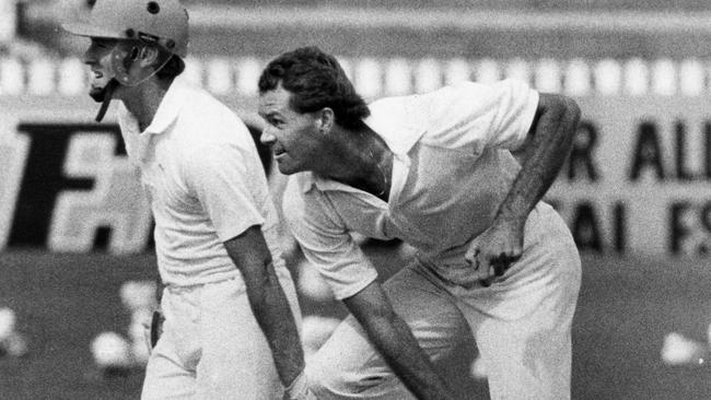 Queensland pace bowler John Maguire during his five-wicket performance. David Kelly is the batsman.