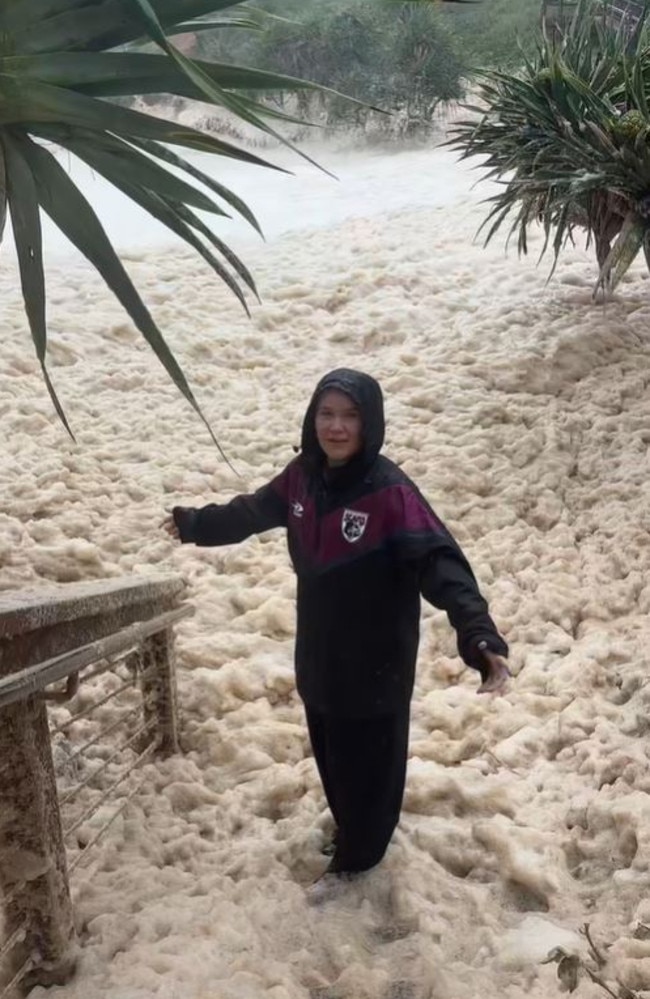 A woman has been slammed for her "stupidity" after diving into sea foam. Picture: TikTok/Izabella Bower