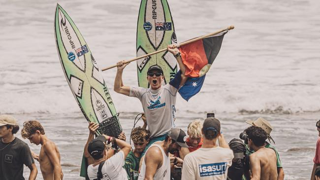 Henry celebrating on the beach after taking out the gold medal in the under-18 boys division. Picture: ISA/Pablo Franco