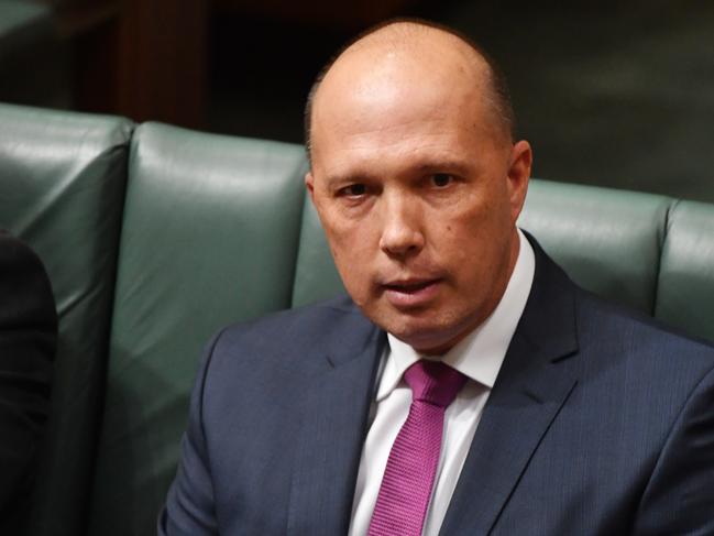 Minister for Home Affairs and Minister for Immigration and Border Protection Peter Dutton during Question Time in the House of Representatives at Parliament House in Canberra, Tuesday, February 6, 2018. (AAP Image/Mick Tsikas) NO ARCHIVING