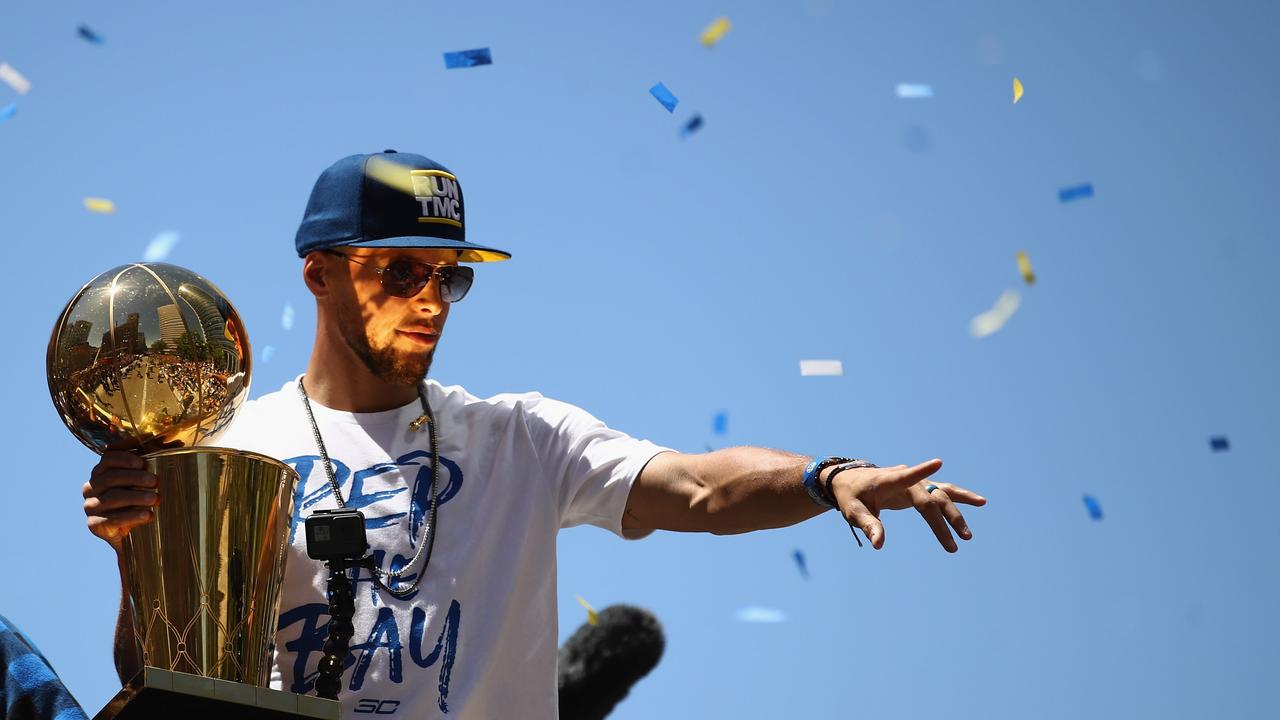 Stephen Curry of the Warriors celebrates in Oakland.