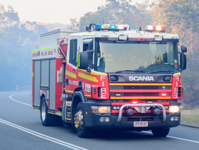 Queensland Fire and Emergency Services rush to the Peregian Beach bushfire. Photo: Wavell Bush Photography.