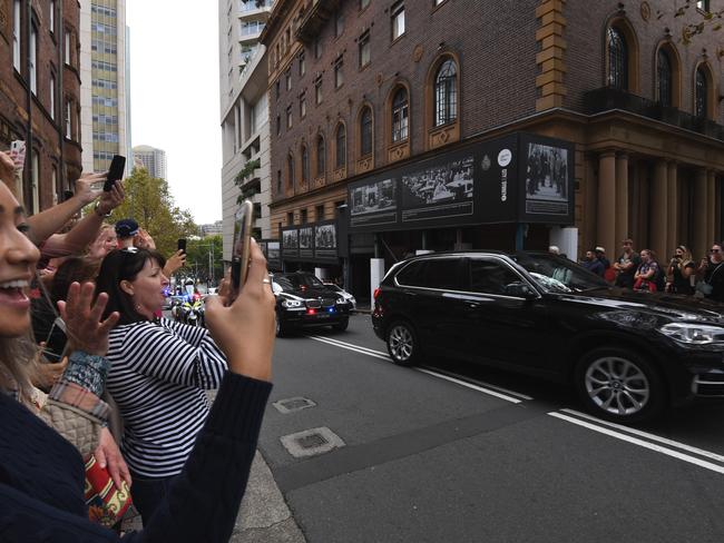 Crowds and security surrounded the Intercontinental Hotel in Sydney for Barack Obama’s arrival. Picture: Peter Rae/AAP