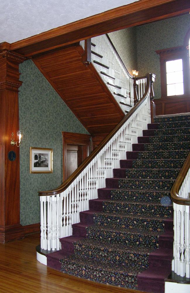 The main staircase leading into the lobby of the Stanley Hotel.