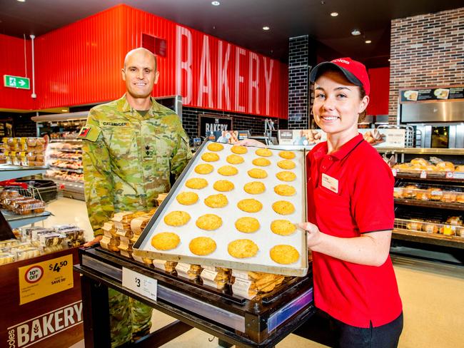 Chairman of Bravery Trust Lieutenant Colonel Garth Callender and Bakery Manager Andie King with Coles ANZAC biscuits at Cole. Picture: Richard Walker/RDW Photography