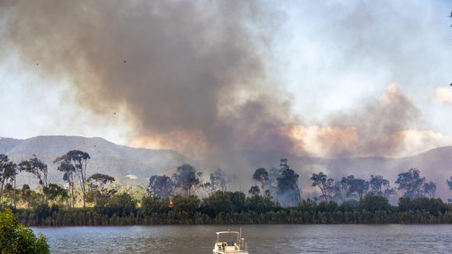 Firefighters are at the scene of a vegetation fire that is in inaccessible country at The Common along the Fitzroy River with the smoke blowing across the water into Depot Hill.