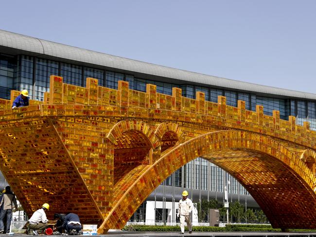 This installation of a 'Golden Bridge of Silk Road' in Beijing was added ahead of a global summit on the project in May this year. Picture: AP Photo/Andy Wong.