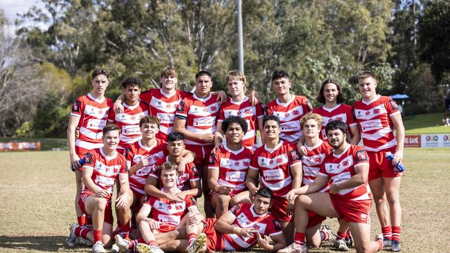 Palm Beach Currumbin SHS players bunch up for a team photo after their crushing victory over Mabel Park. Picture: Matthew Poon