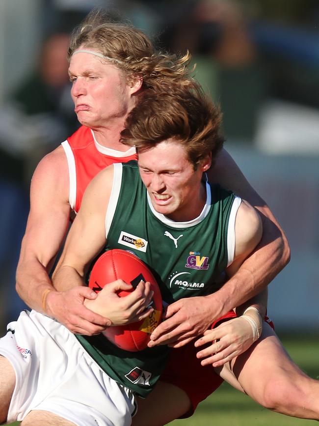 Echuca’s Logan Orr is tackled to the ground.