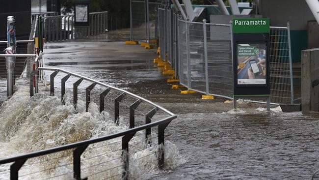 Rain inundated the Charles Street Wharf. Picture: John Appleyard