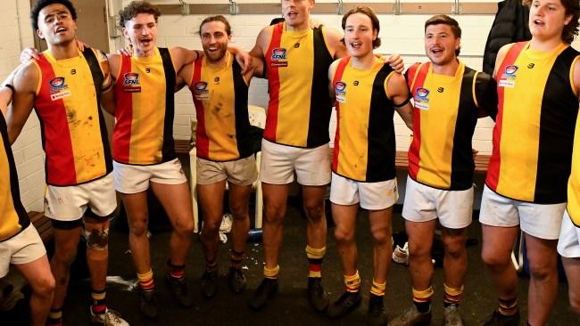 Cheltenham players sing the song in the rooms after winning the Southern Football Netball League 2023 Division 1 Senior match between St Paul's McKinnon and Cheltenham at McKinnon Reserve in McKinnon, Victoria on July 8, 2023. (Photo by Josh Chadwick)