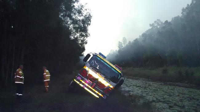 Meerschaum Vale brigade was called to a bush fire on the Tuckean Swamp on Saturday. One fire truck remains stuck in a drain and will hopefully be salvaged tomorrow while crews from NPWS will attempt to contain the fire to the Nature Reserve. Picture: Meerschaum Vale RFS