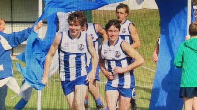 Bronson Block (left) leading the Temora Kangaroos out into a match. Picture: Temora Kangaroos