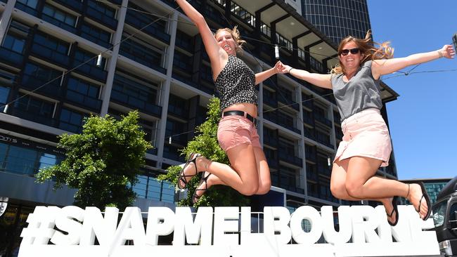 Christine Heinrichs and Anna Bourgeret, from Germany, get into the spirit. Picture: Josie Hayden