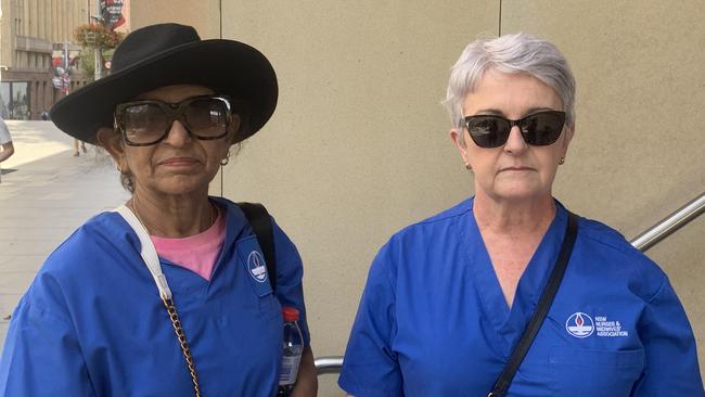 NSWNMA Wagga Wagga branch president Karen Hart and union member Pramajit Kang flew all the way from the regional town to join the action. Picture: Elizabeth Pike