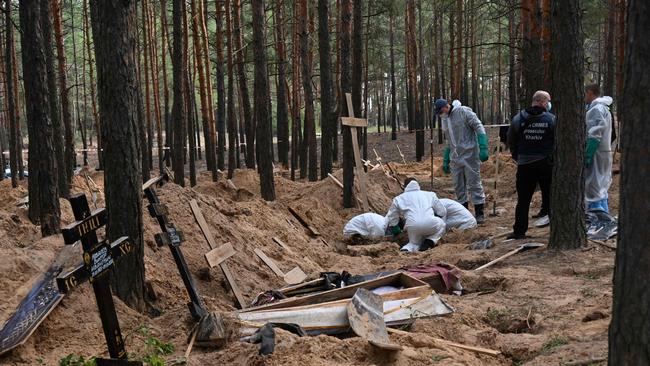 Ukrainian investigators have uncovered more than 440 graves after Izyum was recaptured from the Russians. Picture: Sergey Bobok / AFP