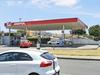 Gunman on run after servo holdup