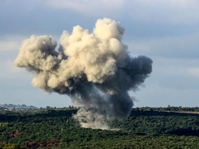 TOPSHOT - Smoke billows from the site of an Israeli strike that targeted the outskirts of the southern Lebanese village of Zibqin on September 22, 2024. The Israeli army said that more than 100 projectiles were fired from Lebanon on September 22 and in response to the incoming fire from Hezbollah, it had launched new strikes on the group's targets in southern Lebanon. (Photo by Kawnat HAJU / AFP)