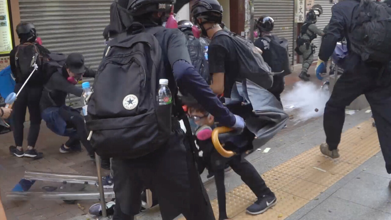 Hong Kong Police Officer Shoots Protester